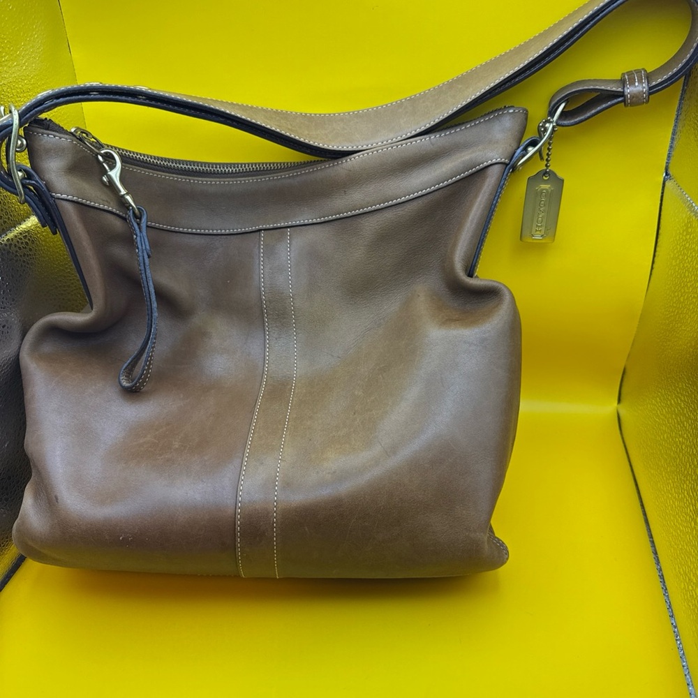 COACH Legacy Slim Style 9325 
Coach Brown Leather Hobo Bag with Silver Hardware